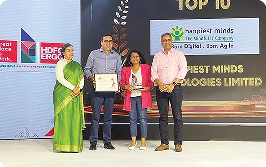Sachin Khurana, Chief People Officer & Puja Agarwal, Head – Wellness and Benefits receiving the GPTW Top 10 Best Workplaces in Health & Wellness Award at Mumbai.